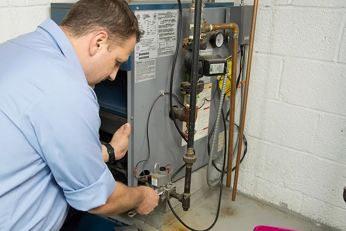 Furnace Repair Monterey Park CA — heating technician servicing a furnace