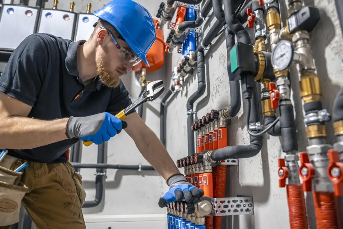 Furnace Igniter Replacement in Garvey Ranch Monterey Park CA — technician working on a residential furnace