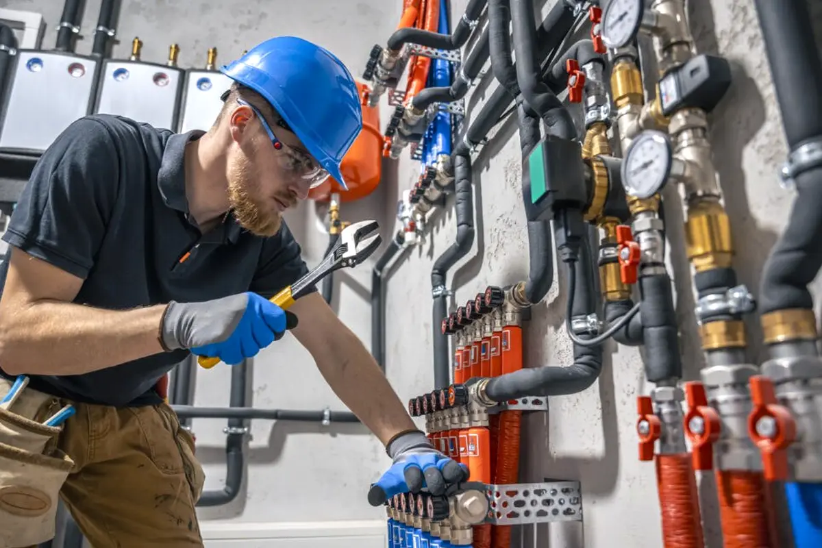 Furnace Installation & Replacement in Sequoia Monterey Park CA — technician working on a residential furnace
