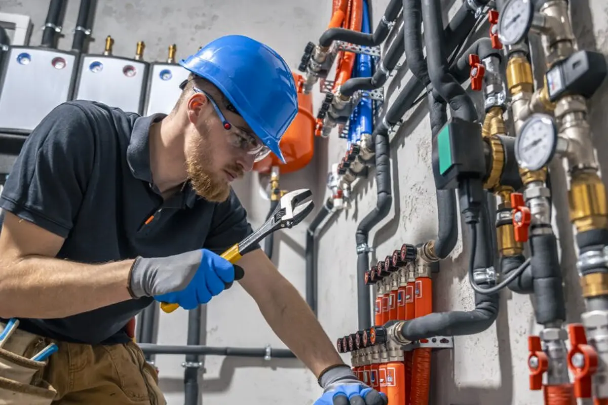 Gas Furnace Repair in Garvey Ranch Monterey Park CA — technician working on a residential furnace