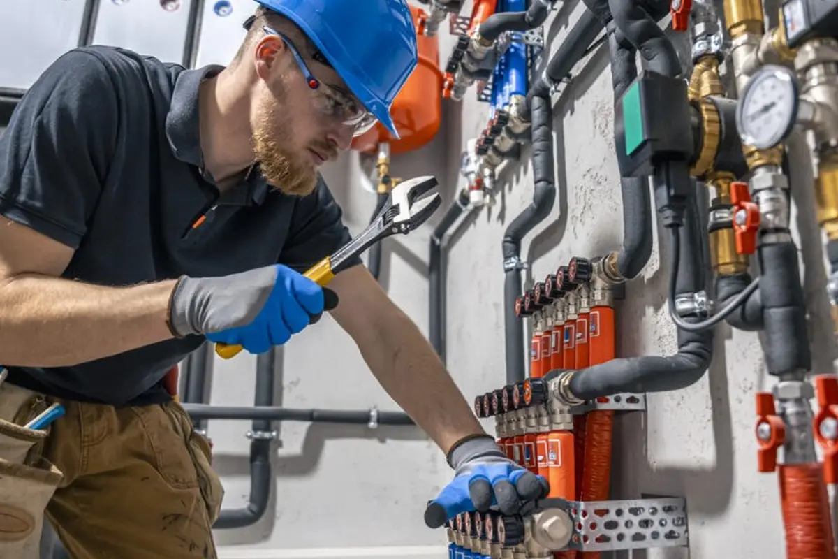 Gas Furnace Repair in Midwick Monterey Park CA — technician working on a residential furnace