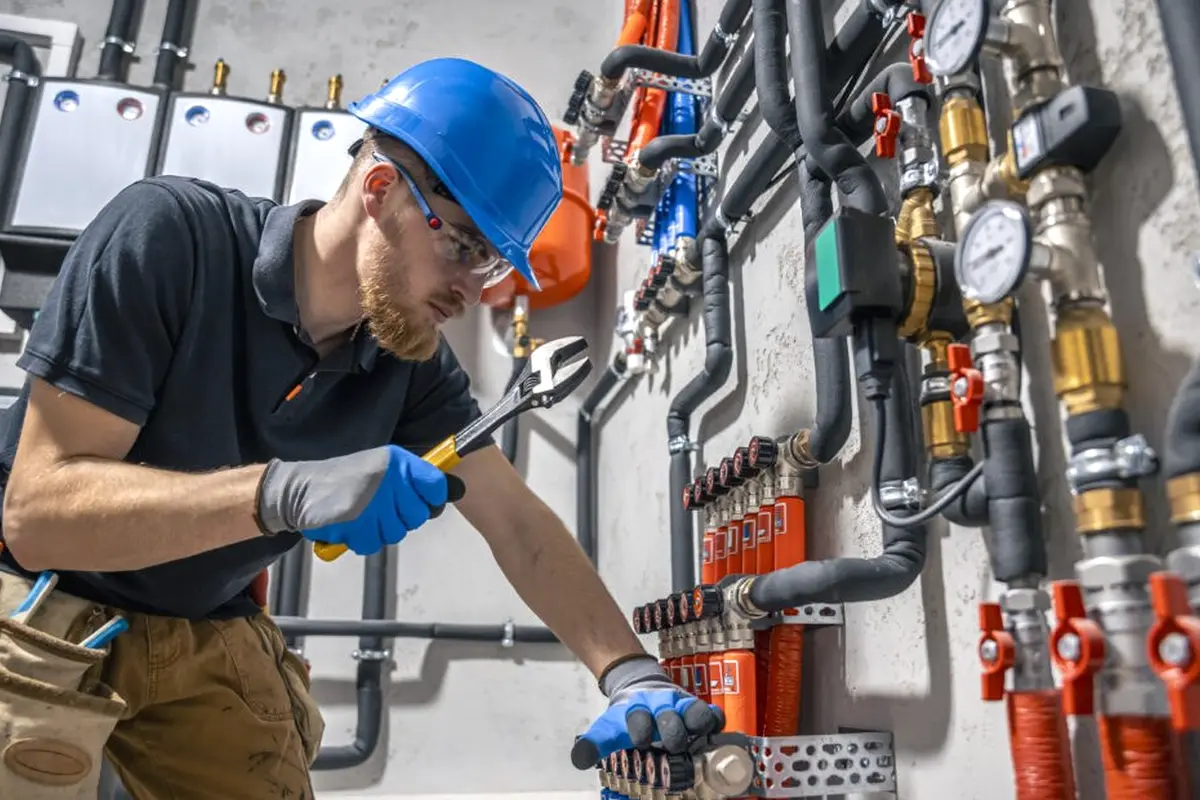 Heat Exchanger Repair in Barnes Park Monterey Park CA — technician working on a residential furnace